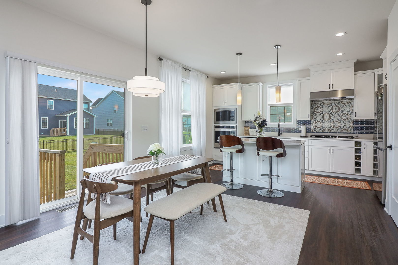 3539 Crosswater Court Elgin, IL 60124 - Photo 8 of 26 a dining room with furniture and wooden floor
