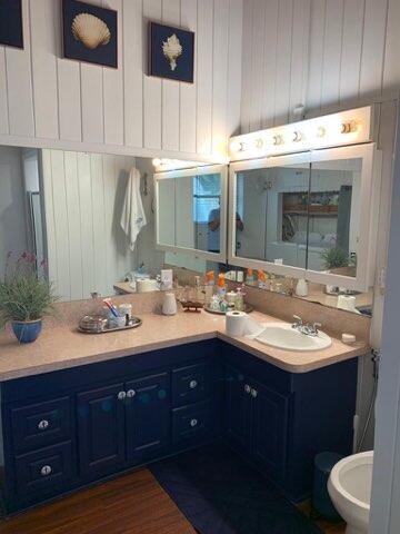 919 Lobster Lane Key Largo, FL 33037 - Photo 7 of 21 a bathroom with a double vanity sink and a mirror