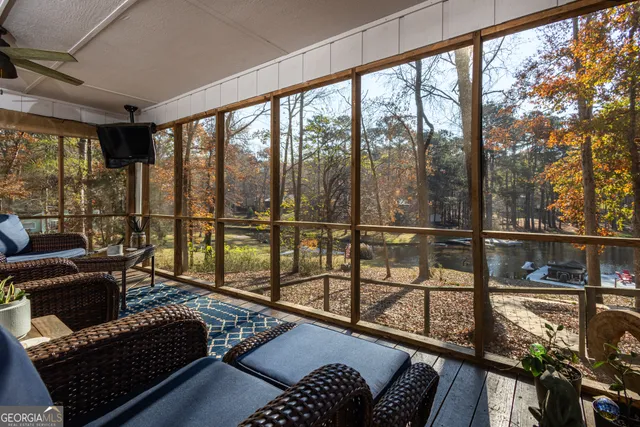 a living room with large windows