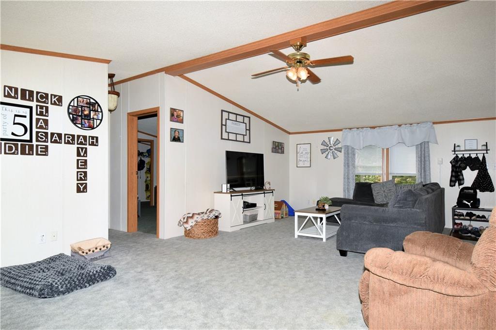 478 Hadley Road Greenville, PA 16125 - Photo 3 of 15 a living room with furniture and a flat screen tv