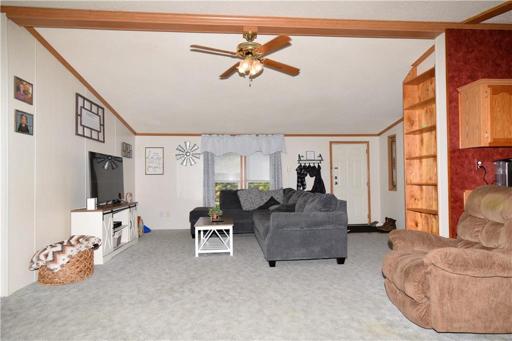 478 Hadley Road Greenville, PA 16125 - Photo 4 of 15 a living room with furniture and a flat screen tv