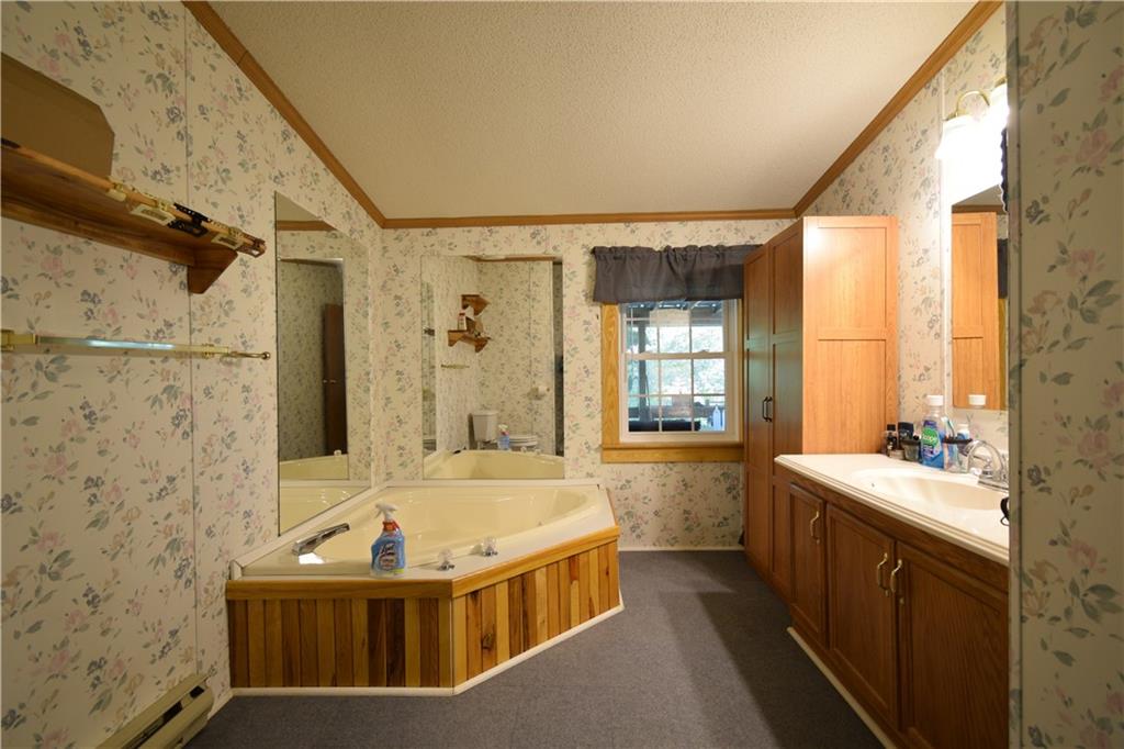 478 Hadley Road Greenville, PA 16125 - Photo 9 of 15 a bathroom with a tub sink and mirror
