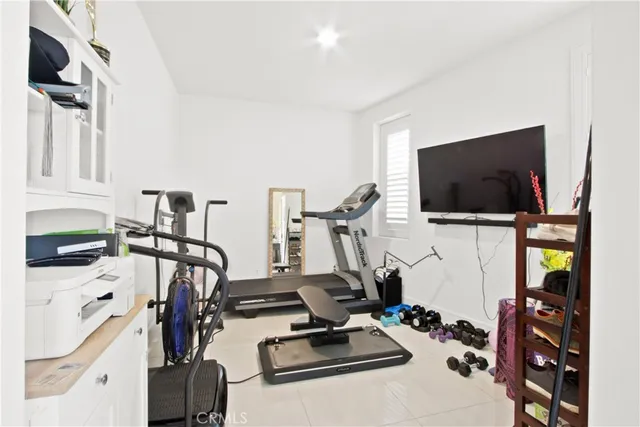 a bathroom with a sink toilet and a mirror