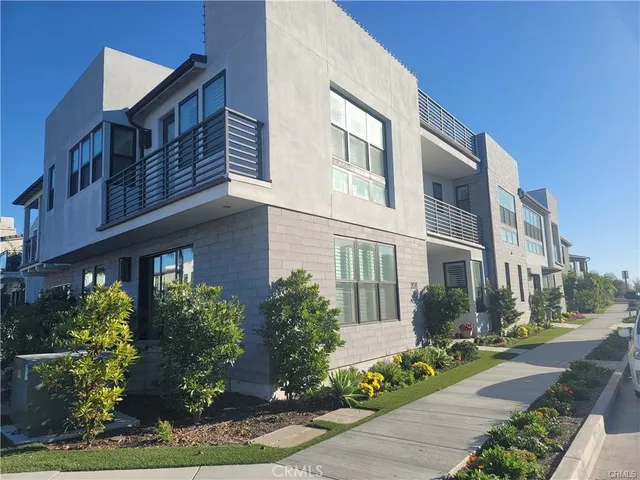 a front view of building with yard