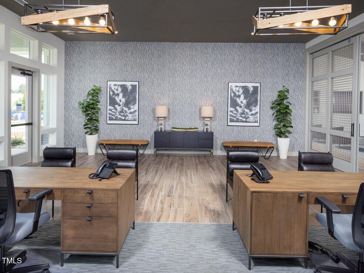3520 Pinetree Grove Lane, Unit A1 Raleigh, NC 27604 - Photo 9 of 26 a living room with furniture and a wooden floor