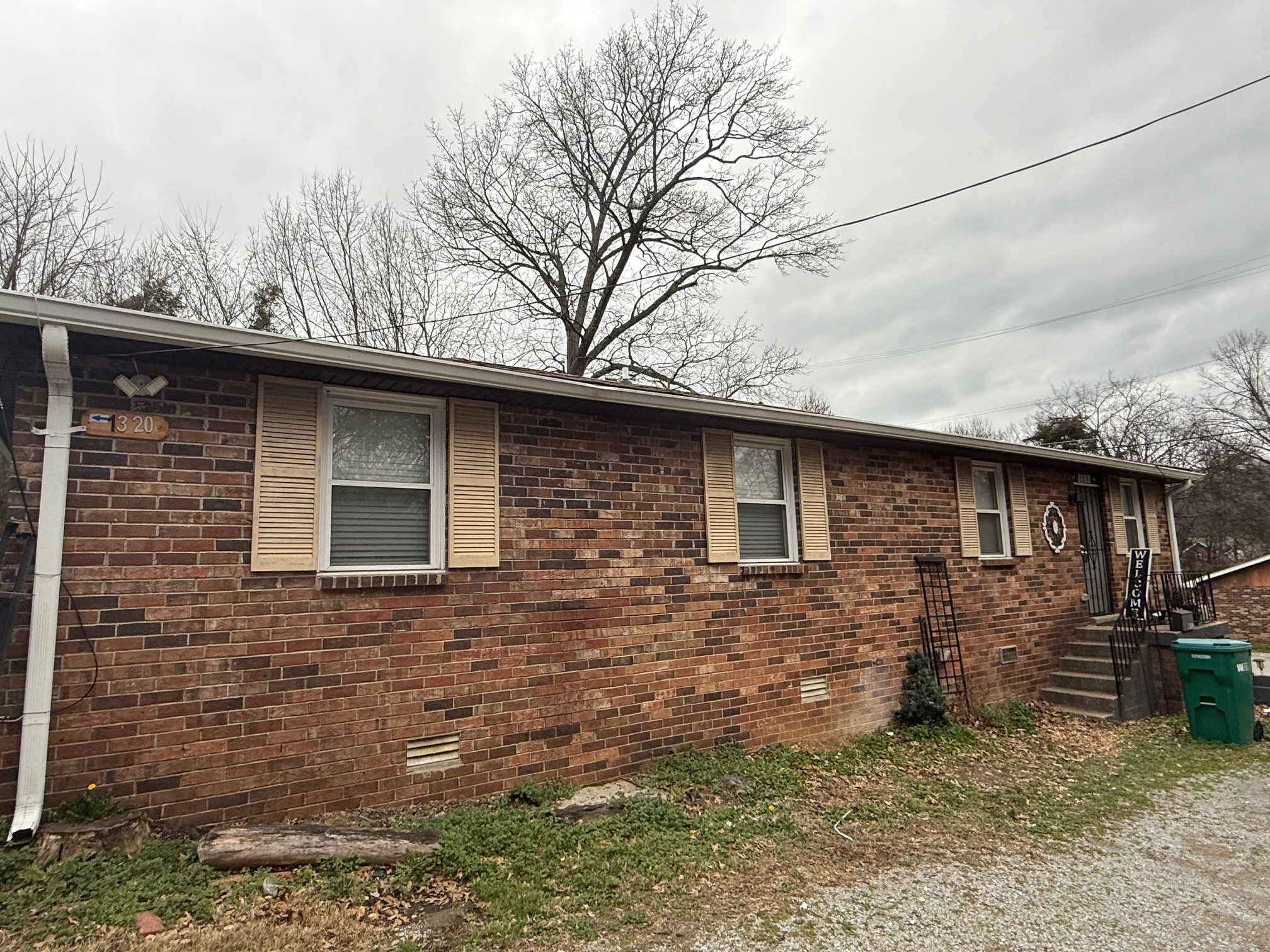 a backyard of a house with lots of green space
