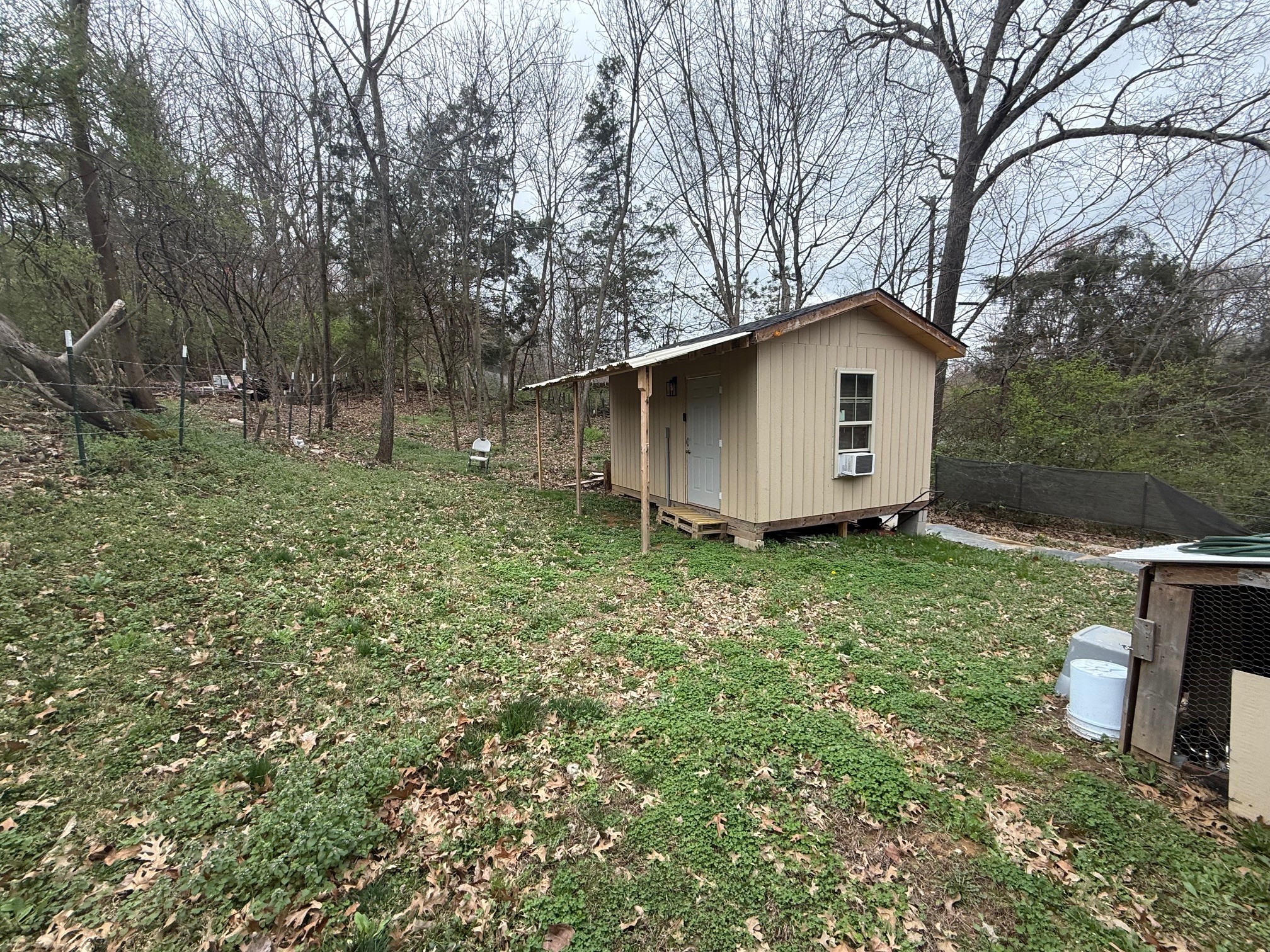 1320 Tulip Grove Road Hermitage, TN 37076 - Photo 4 of 6 a house is sitting in middle of the green field