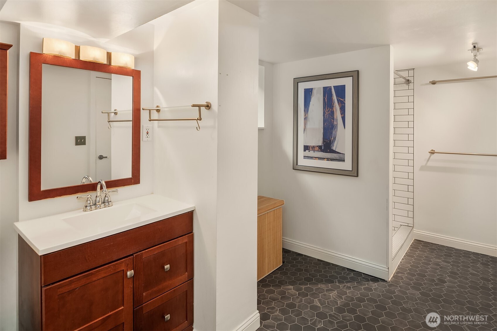 4846 South Juneau Street Seattle, WA 98118 - Photo 23 of 38 a bathroom with a sink and a mirror