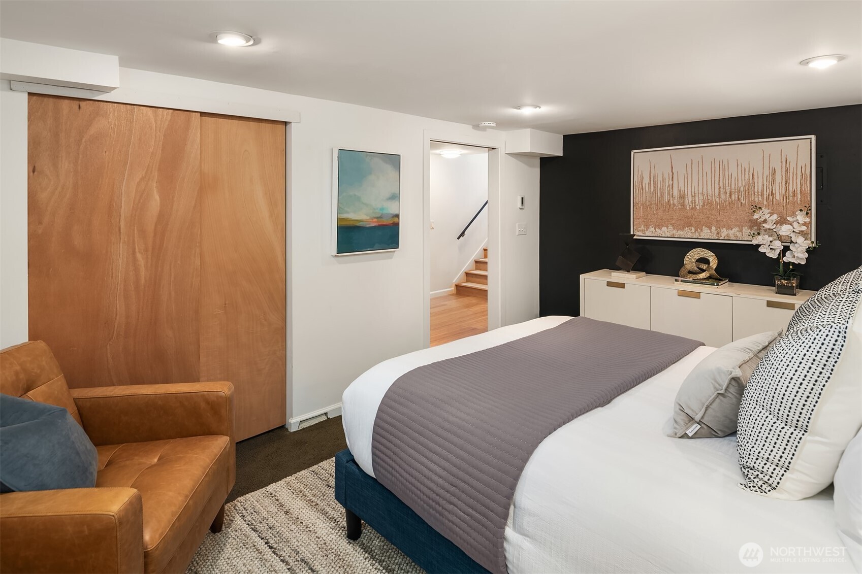 4846 South Juneau Street Seattle, WA 98118 - Photo 26 of 38 a bedroom with a bed and a couch