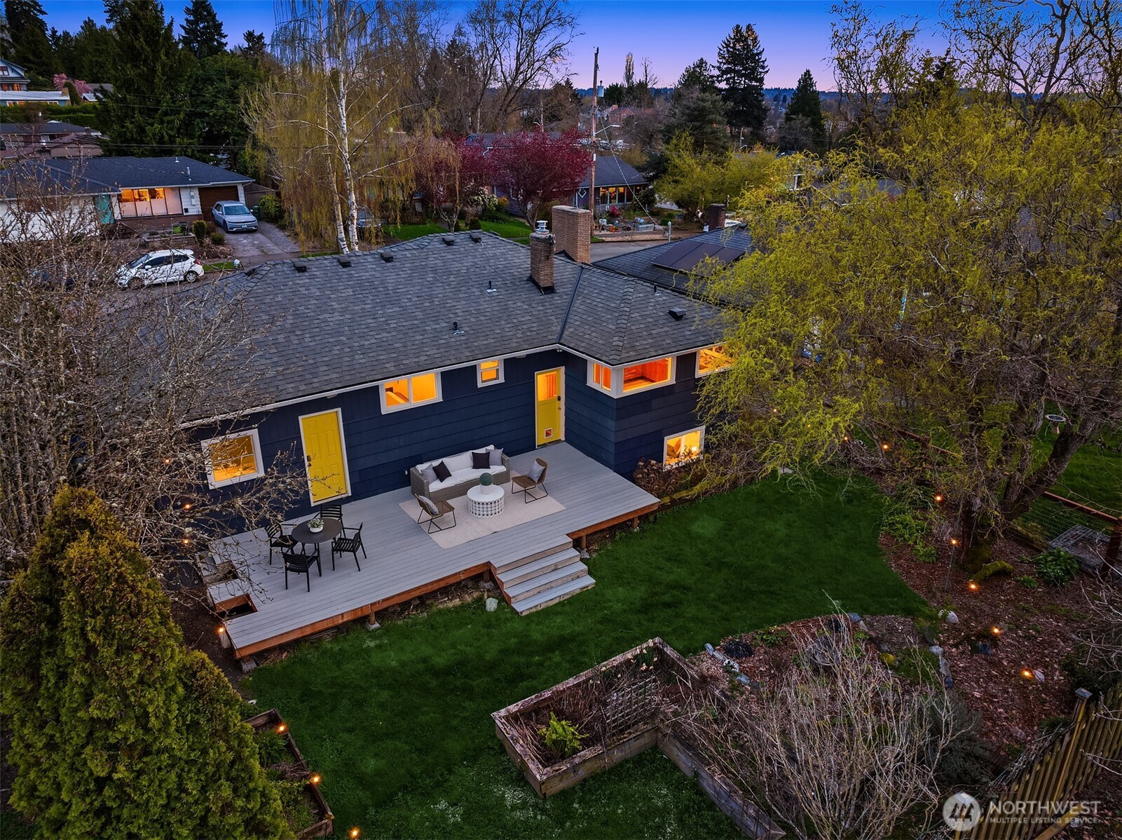 4846 South Juneau Street Seattle, WA 98118 - Photo 28 of 38 an aerial view of a house with a yard