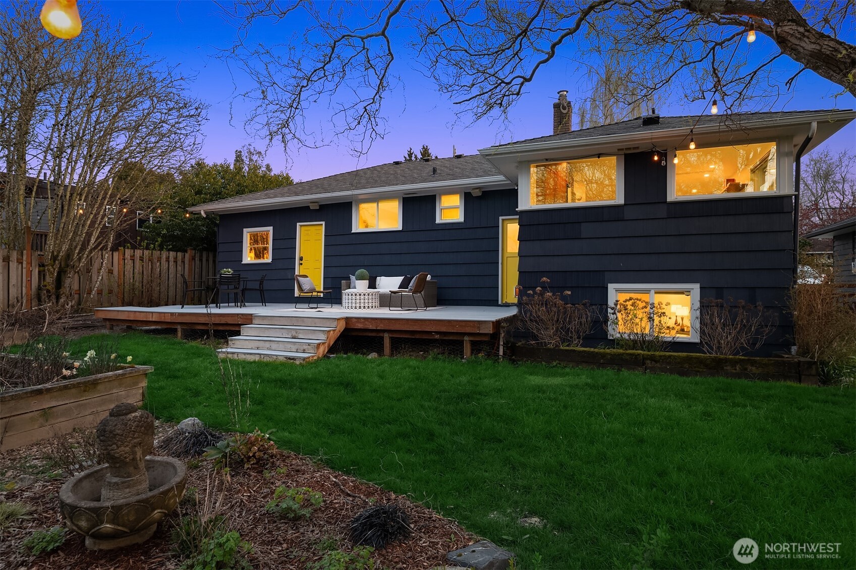 4846 South Juneau Street Seattle, WA 98118 - Photo 29 of 38 a front view of a house with a yard