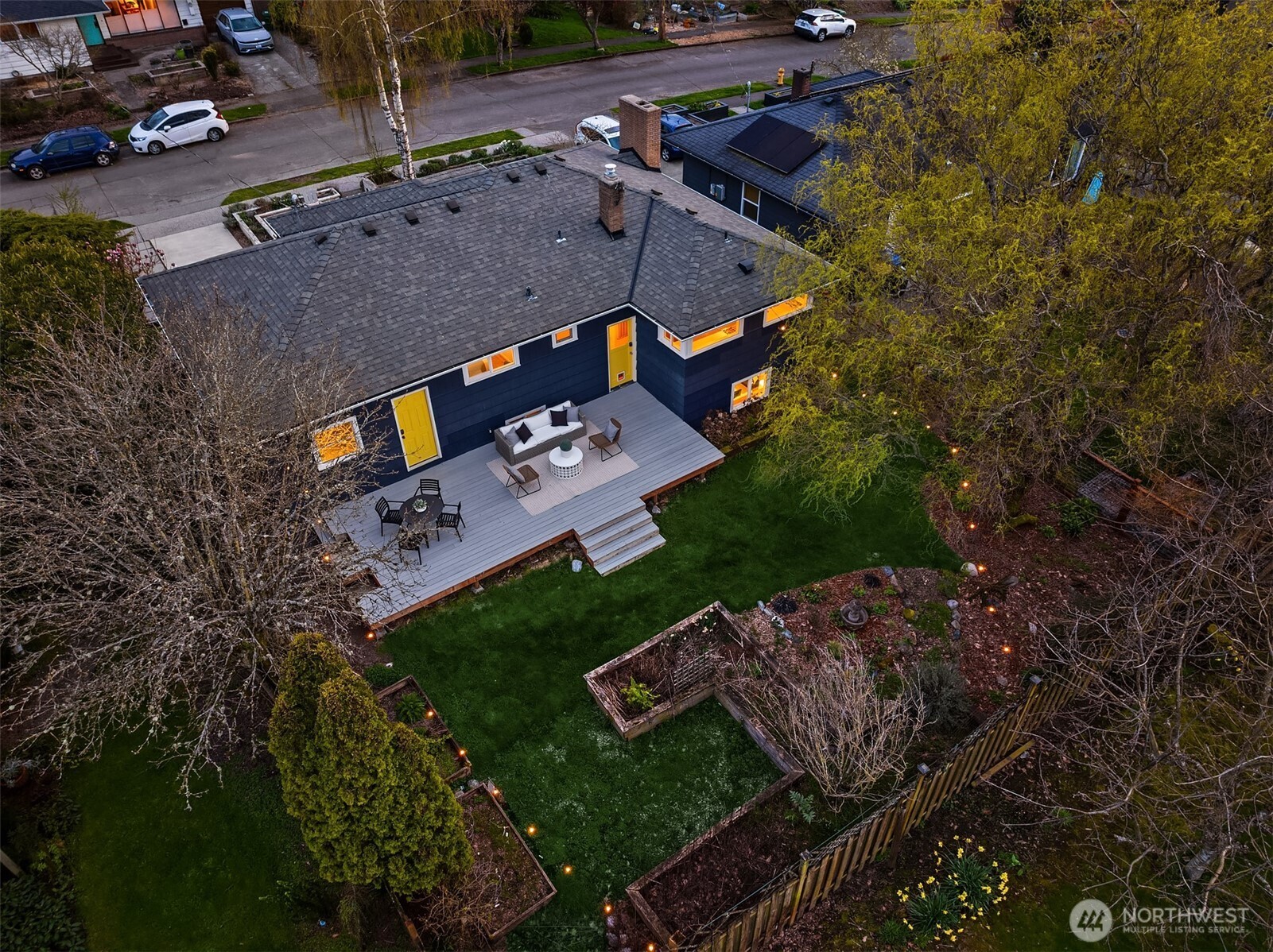 4846 South Juneau Street Seattle, WA 98118 - Photo 32 of 38 an aerial view of a house with a yard
