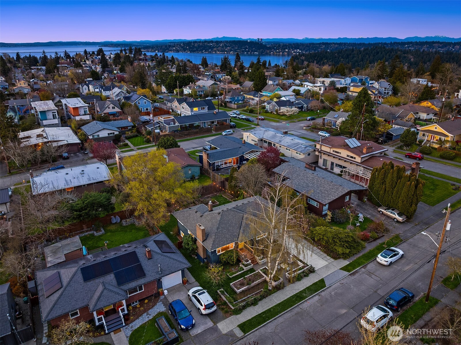 4846 South Juneau Street Seattle, WA 98118 - Photo 36 of 38 an aerial view of a house with a lake view