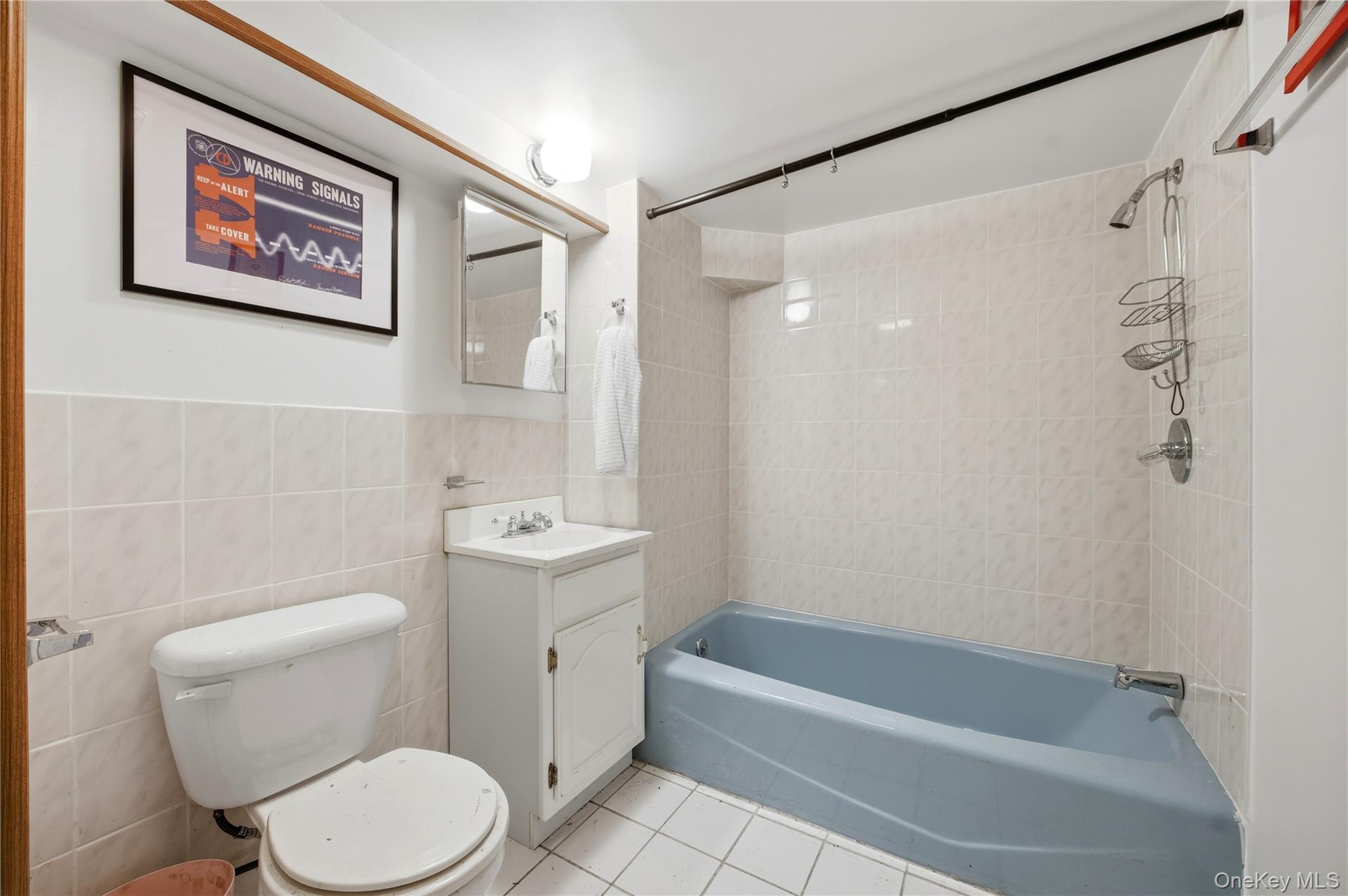 35 Quiat Road Mountain Dale, NY 12763 - Photo 18 of 27 Full bathroom with vanity, shower / bathtub combination, light tile patterned flooring, and tile walls