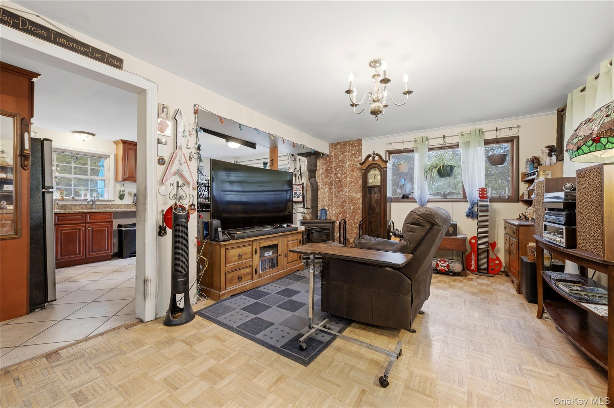 35 Quiat Road Mountain Dale, NY 12763 - Photo 4 of 27 Living area with parquet flooring and a chandelier