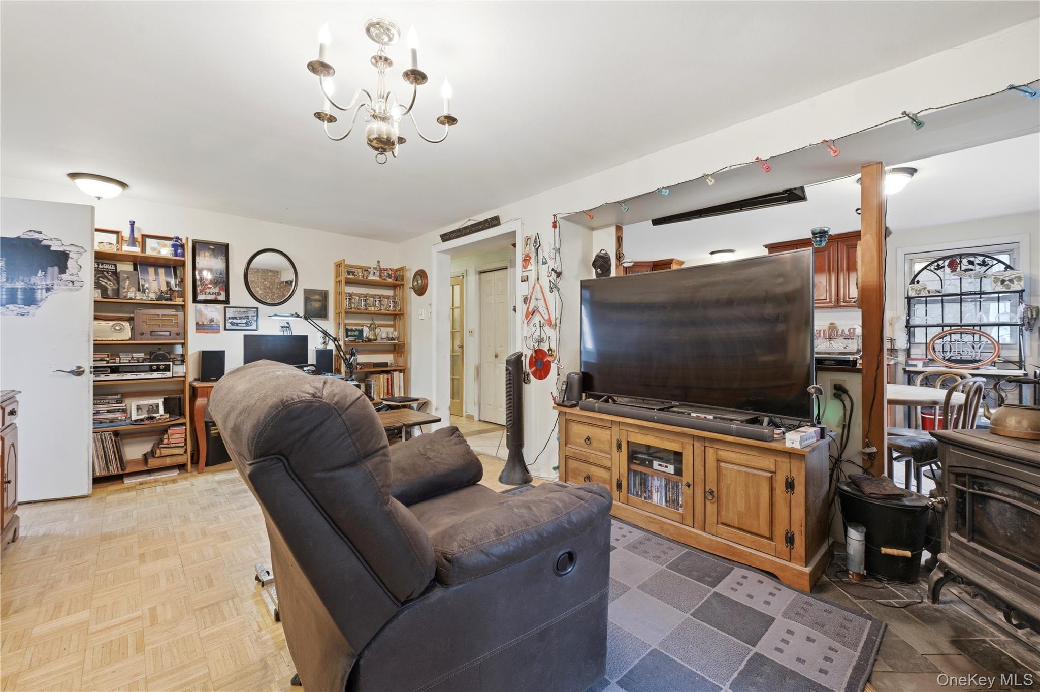 35 Quiat Road Mountain Dale, NY 12763 - Photo 8 of 27 Living area featuring a chandelier
