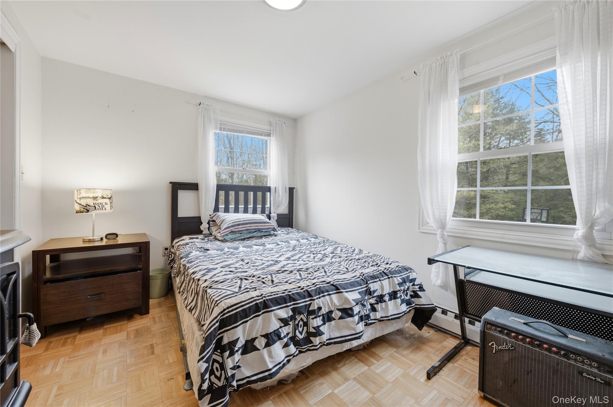 35 Quiat Road Mountain Dale, NY 12763 - Photo 10 of 27 Bedroom featuring baseboard heating and parquet floors