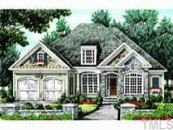 24 Rivers Edge Court Timberlake, NC 27583 - Photo 1 of 4 a front view of a house with garden