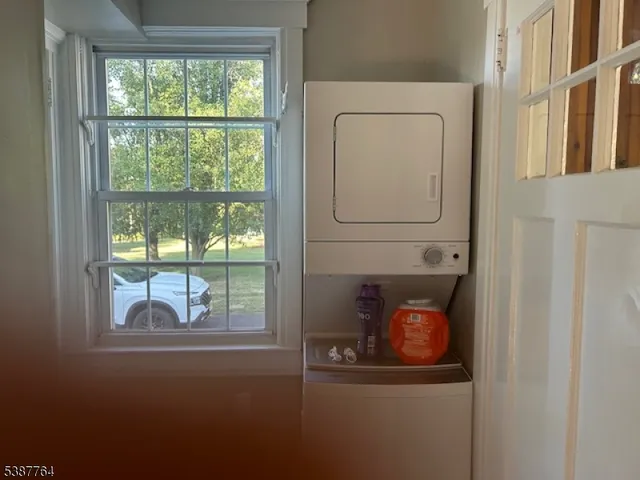 a room that has a bed and a window