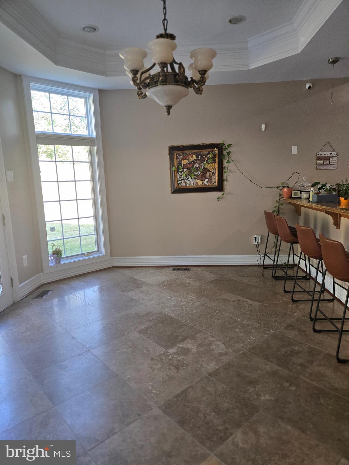 7145 Brooks Road Highland, MD 20777 - Photo 11 of 89 an empty room with windows and ceiling fan