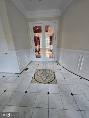 a bathroom with a sink a large mirror and a shower