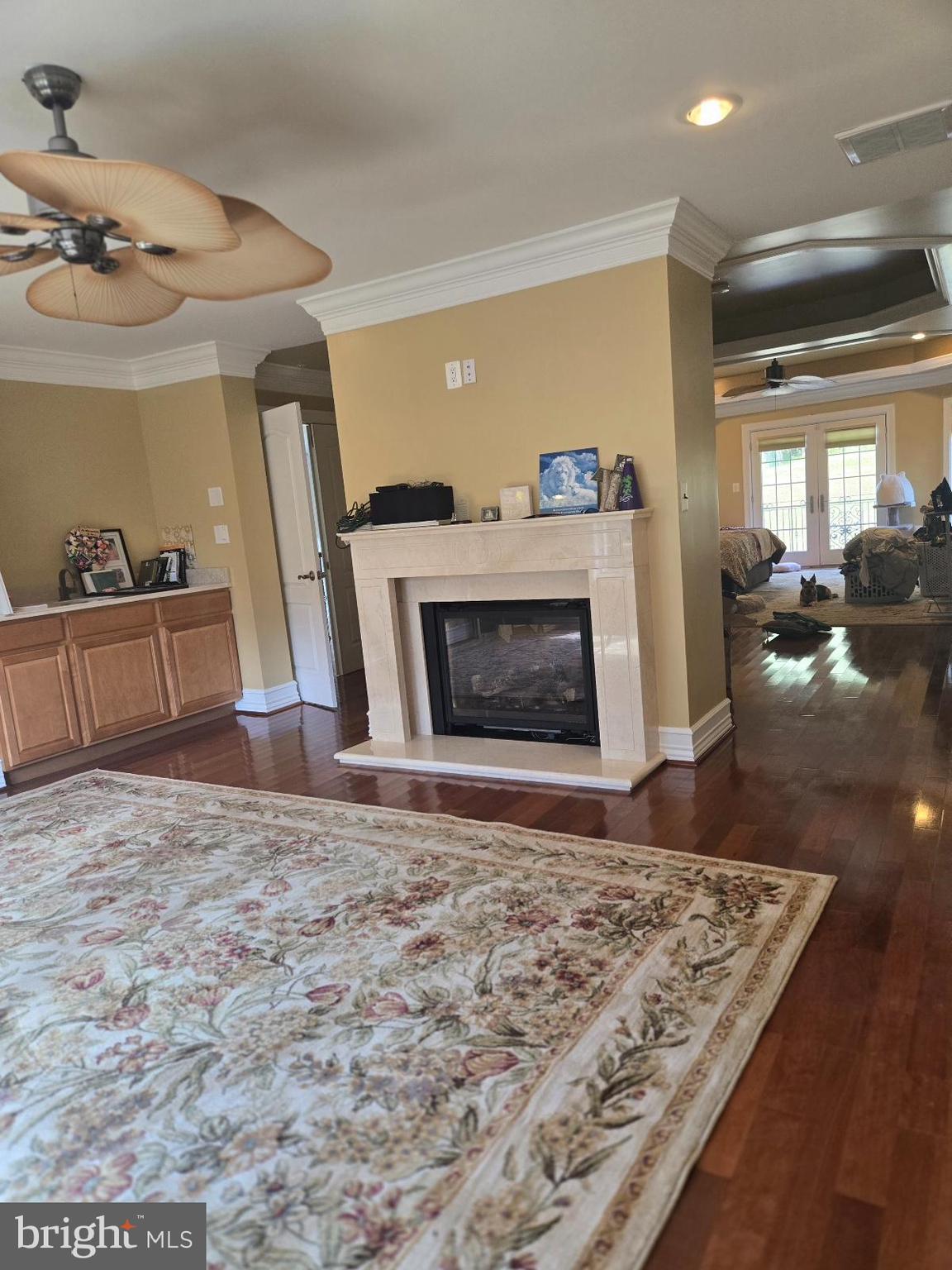 7145 Brooks Road Highland, MD 20777 - Photo 28 of 89 a living room with furniture and a fireplace