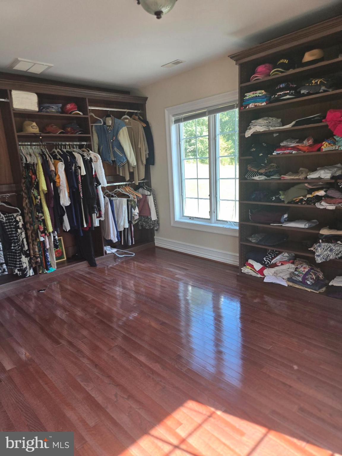 7145 Brooks Road Highland, MD 20777 - Photo 31 of 89 an empty room with wooden floor and closet