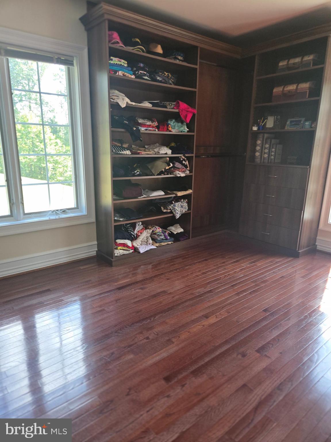 7145 Brooks Road Highland, MD 20777 - Photo 32 of 89 a view of a room with wooden floor and window
