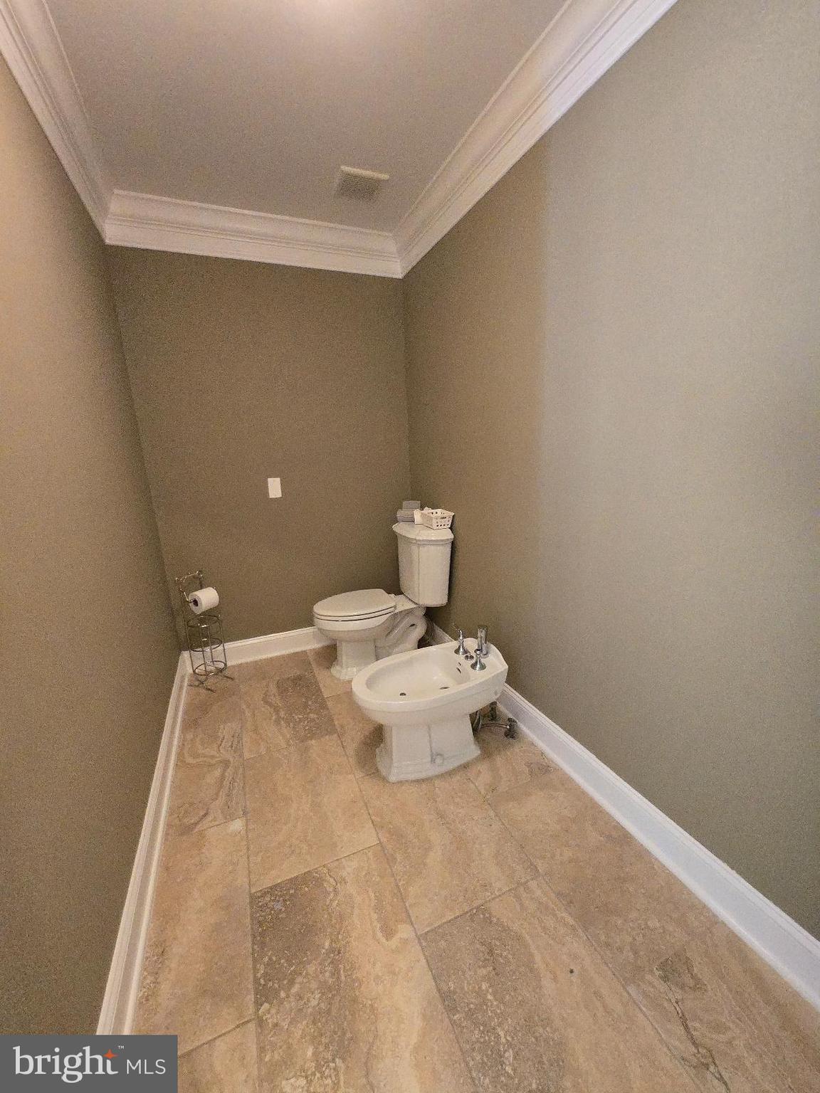 7145 Brooks Road Highland, MD 20777 - Photo 37 of 89 a bathroom with a toilet and a vanity