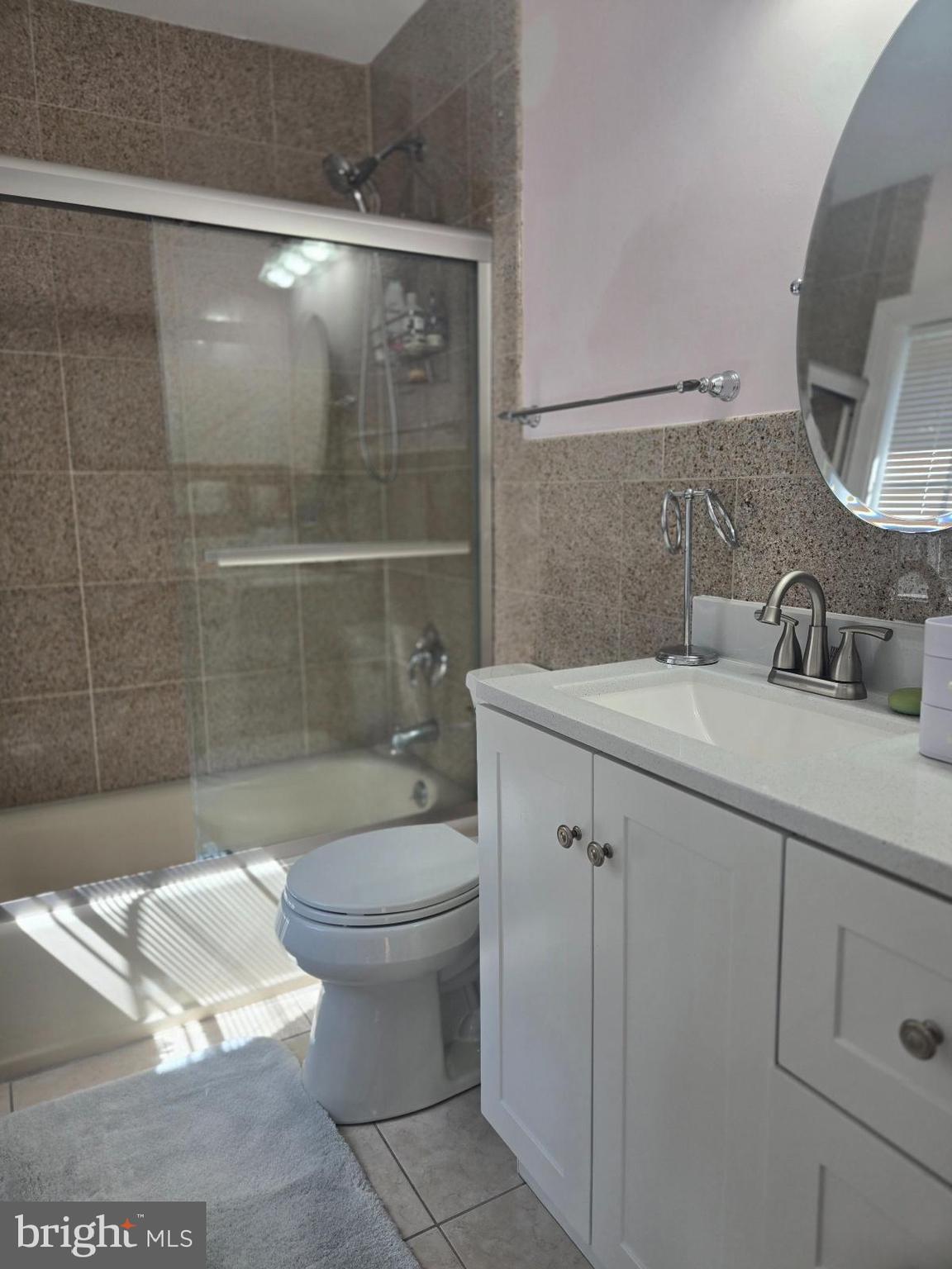 7145 Brooks Road Highland, MD 20777 - Photo 49 of 89 a bathroom with a sink a toilet and shower