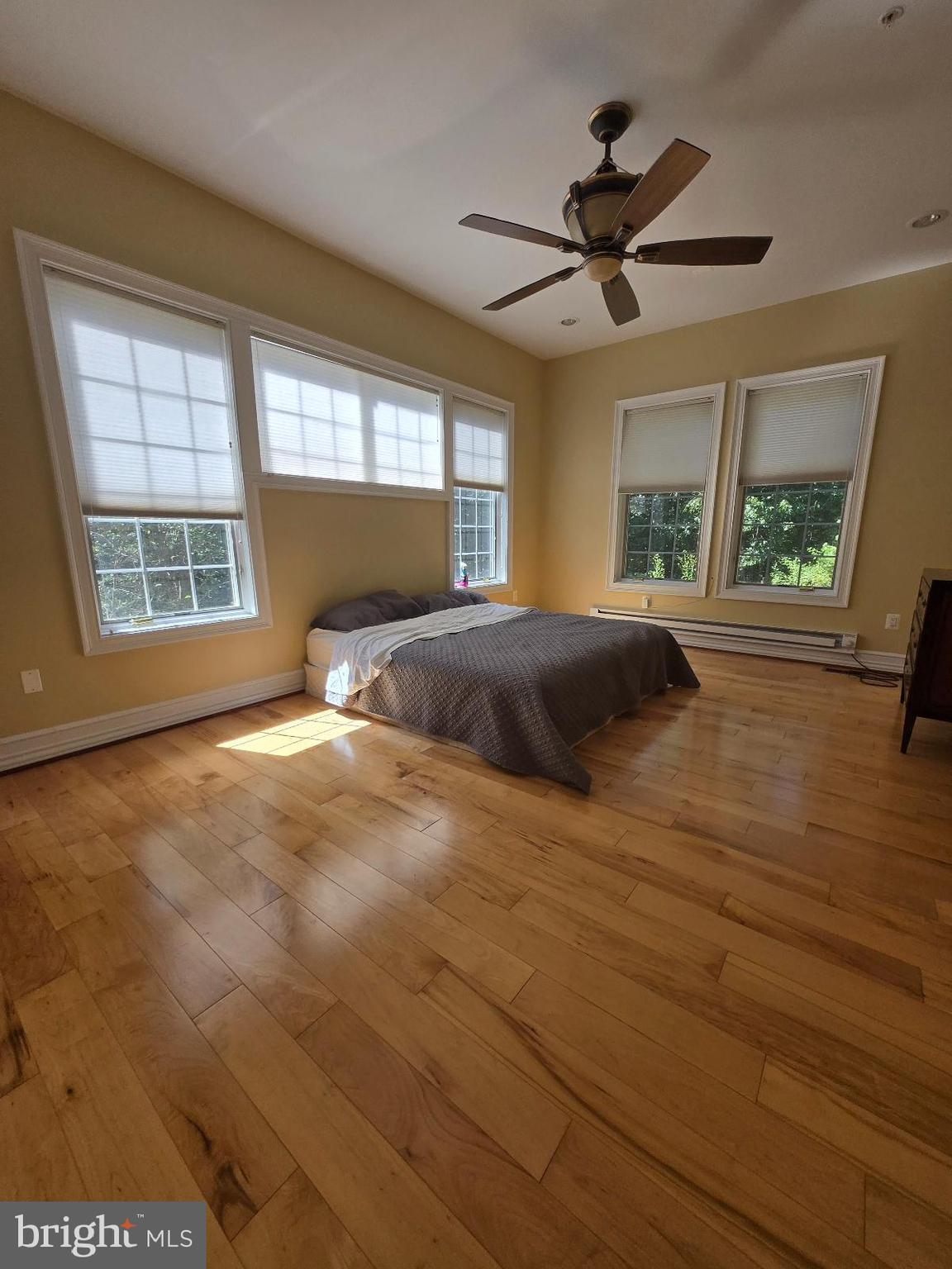 7145 Brooks Road Highland, MD 20777 - Photo 50 of 89 a view of an empty room with a window and wooden floor
