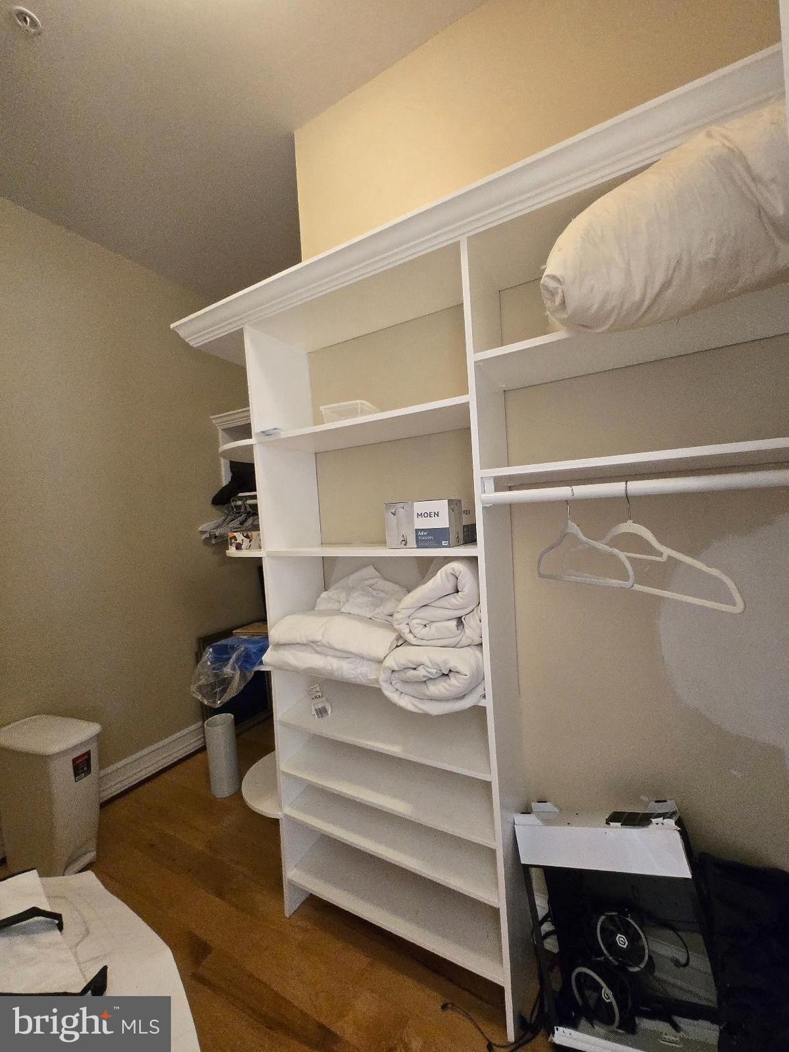 7145 Brooks Road Highland, MD 20777 - Photo 55 of 89 a view of walk in closet with clothes and shoes