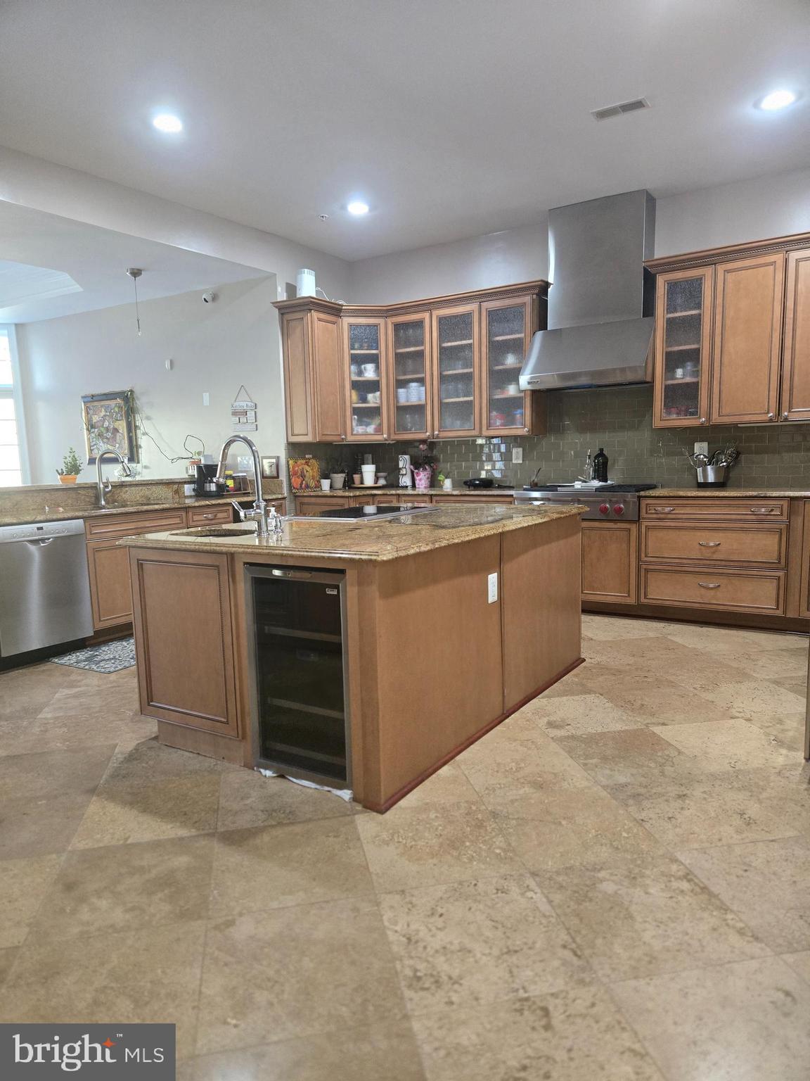 7145 Brooks Road Highland, MD 20777 - Photo 7 of 89 a kitchen with stainless steel appliances granite countertop a stove sink and cabinets