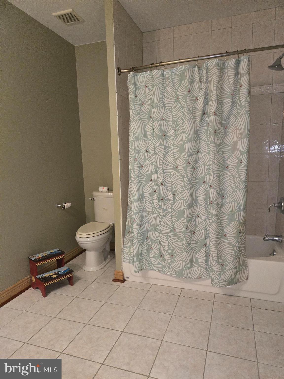 7145 Brooks Road Highland, MD 20777 - Photo 77 of 89 a bathroom with a toilet and a shower
