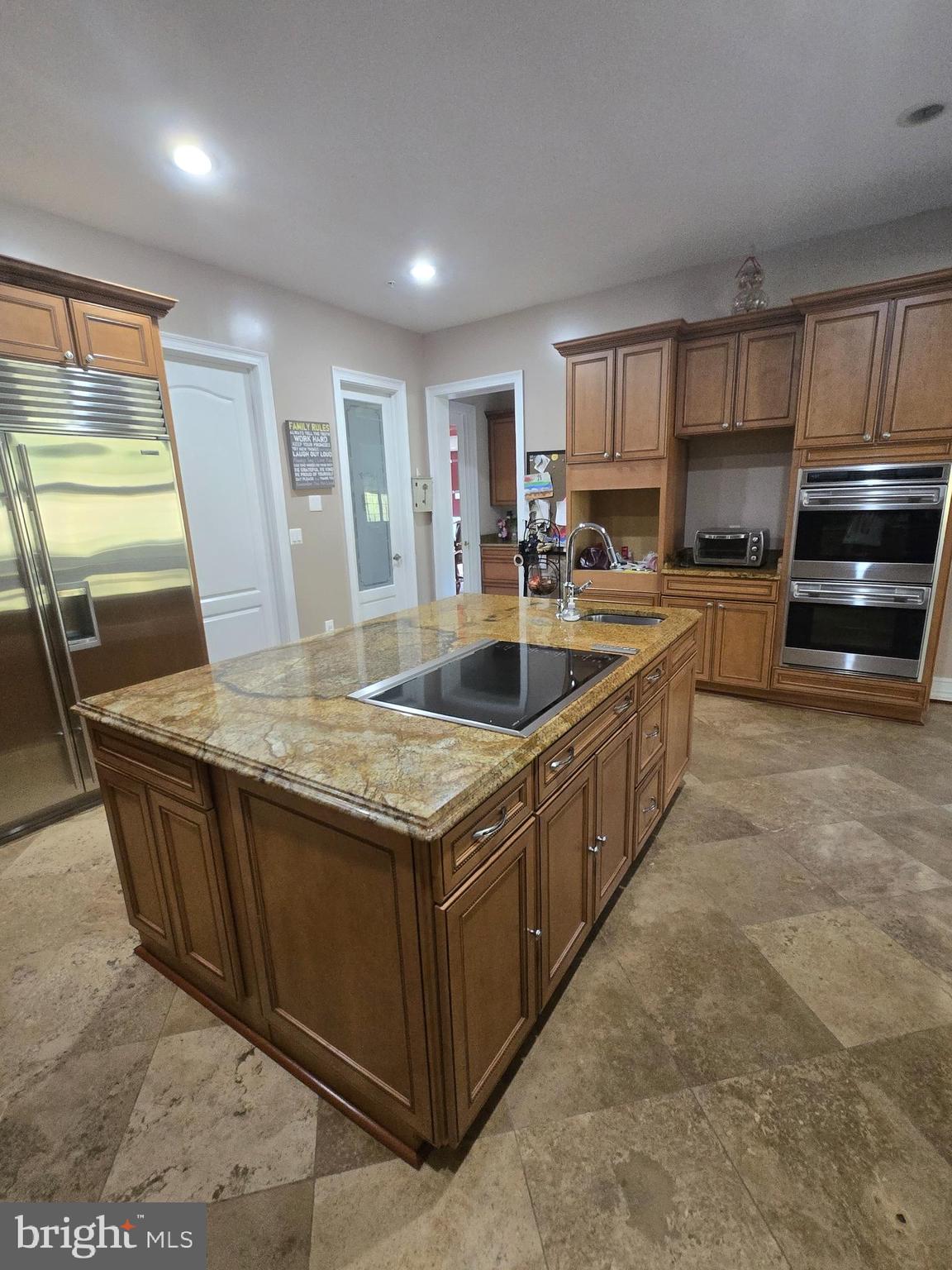 7145 Brooks Road Highland, MD 20777 - Photo 8 of 89 a kitchen with stainless steel appliances granite countertop a sink a stove and a refrigerator
