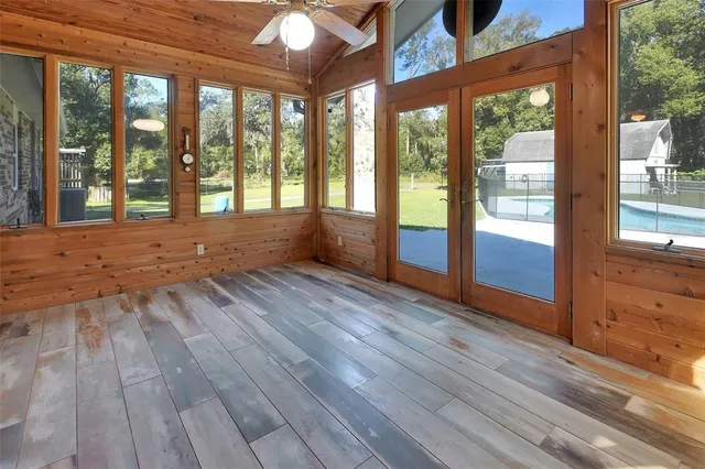 a bathroom with a granite countertop shower