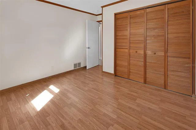 a view of house with garden space and trees