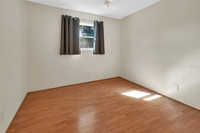 a view of a yard with a lake view