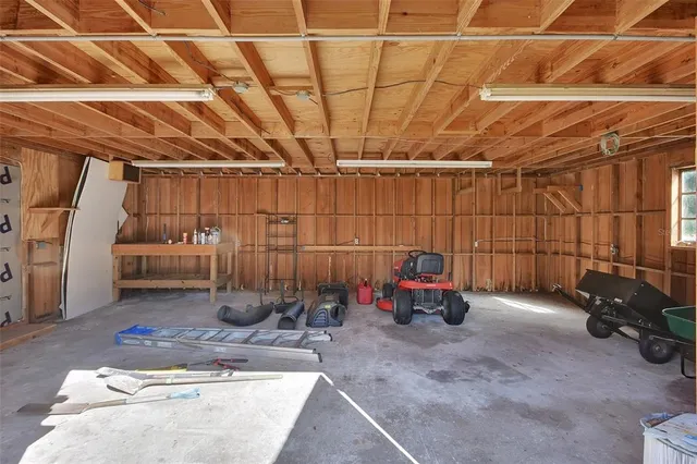 a view of a tree with yard