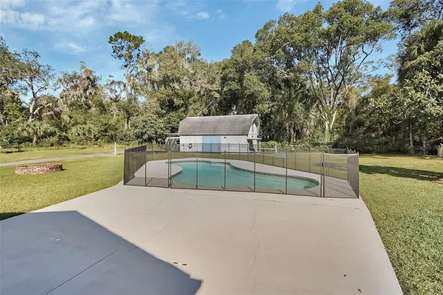an aerial view of a house with a garden
