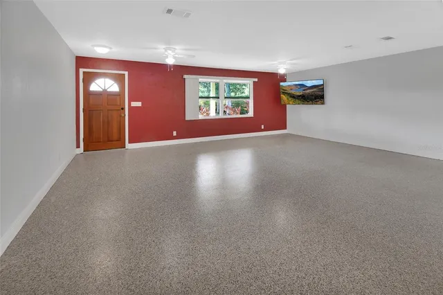 a kitchen with stainless steel appliances granite countertop a stove and a sink