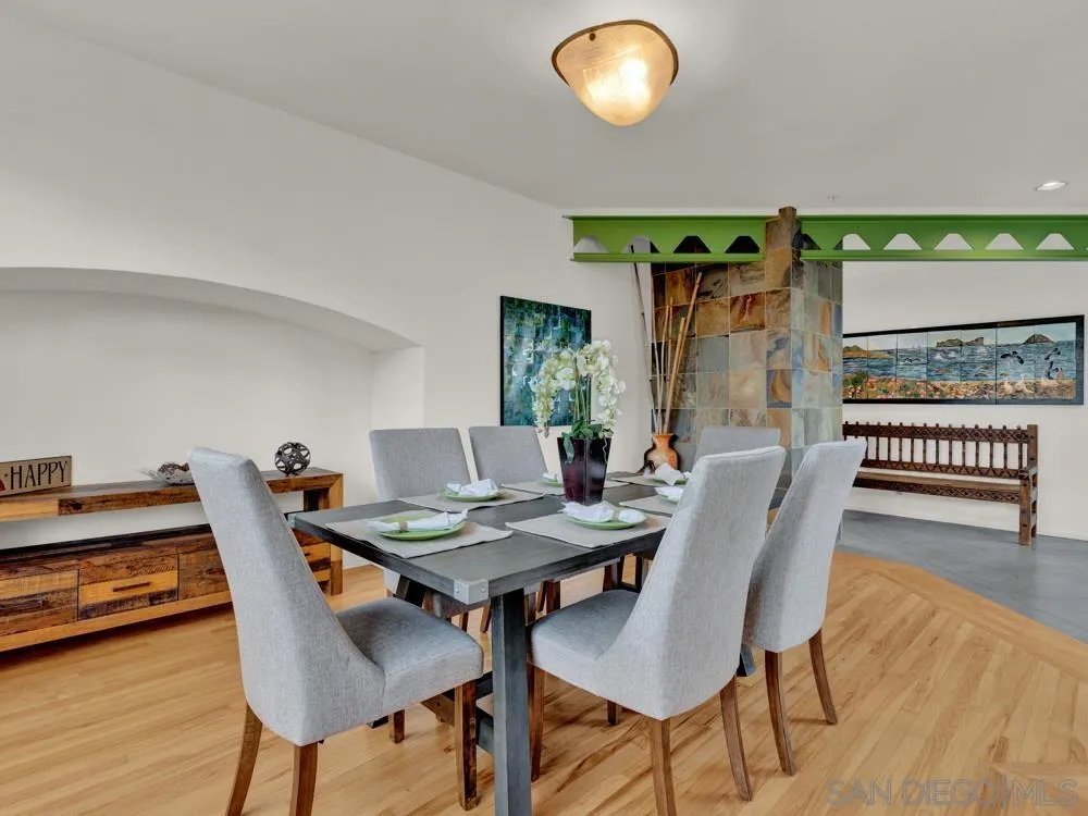 778 Ramona Place Del Mar, CA 92014 - Photo 14 of 72 a view of a dining room with furniture and wooden floor