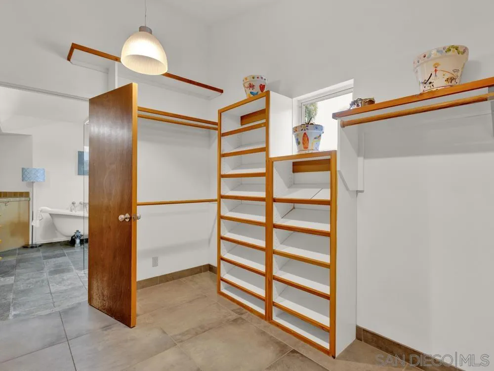 778 Ramona Place Del Mar, CA 92014 - Photo 24 of 72 a view of walk in closet with empty racks