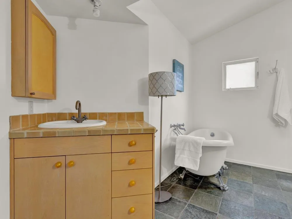 778 Ramona Place Del Mar, CA 92014 - Photo 26 of 72 a bathroom with a sink toilet and mirror