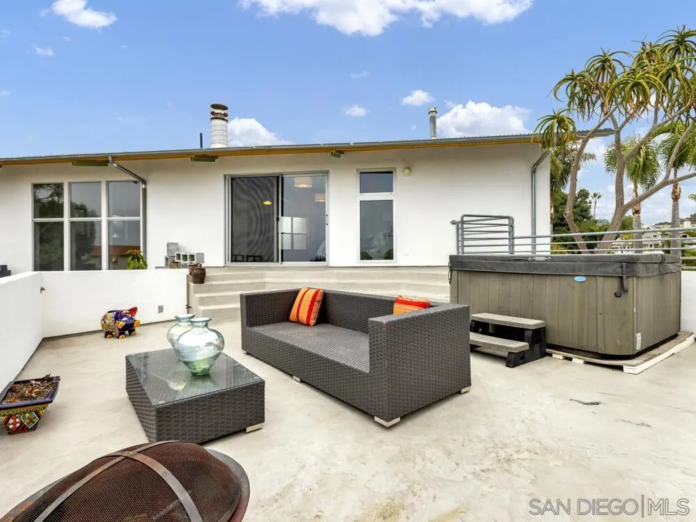 778 Ramona Place Del Mar, CA 92014 - Photo 29 of 72 a living room with furniture and a flat screen tv