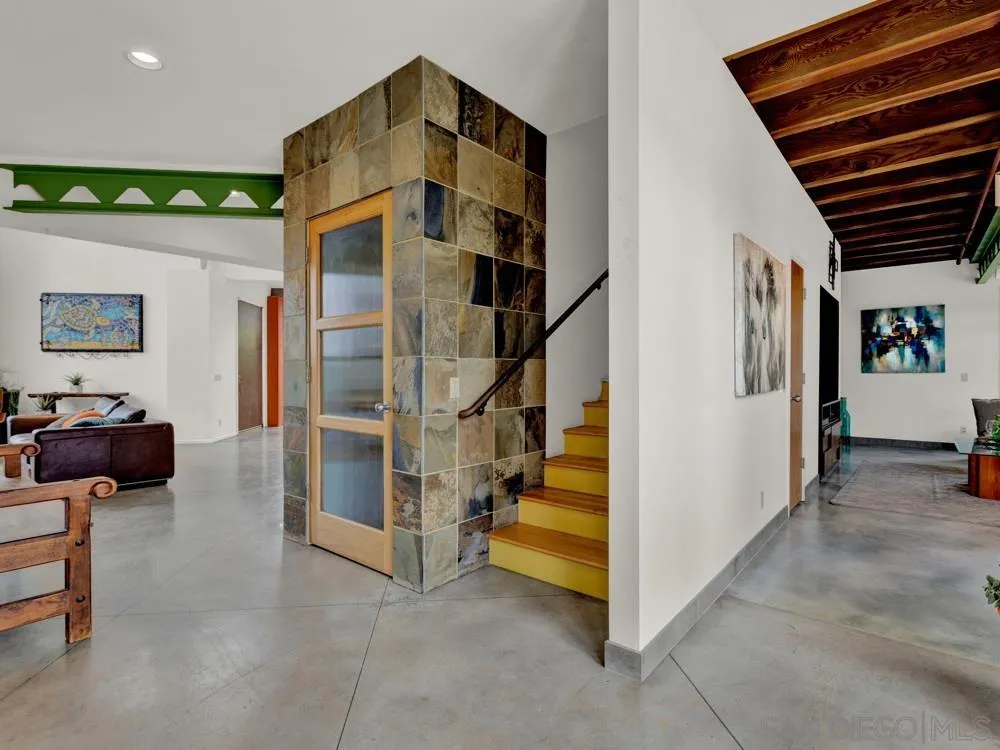 778 Ramona Place Del Mar, CA 92014 - Photo 31 of 72 a view of a livingroom with furniture and staircase