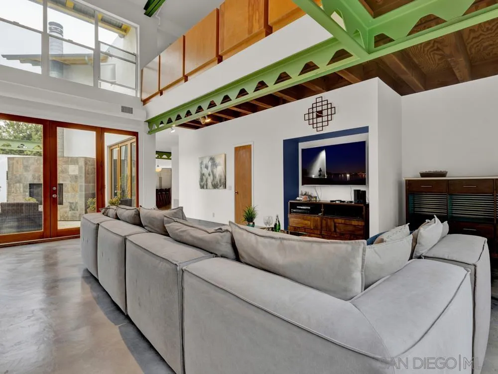 778 Ramona Place Del Mar, CA 92014 - Photo 34 of 72 a living room with furniture and a flat screen tv