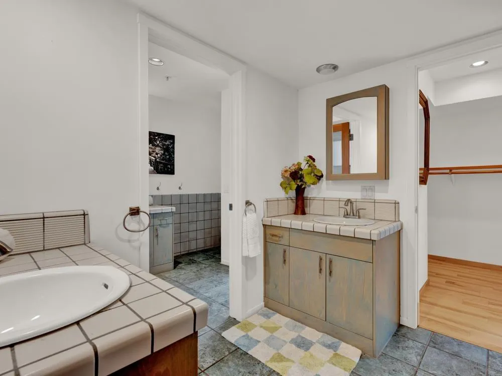 778 Ramona Place Del Mar, CA 92014 - Photo 47 of 72 a room with a sink and a mirror