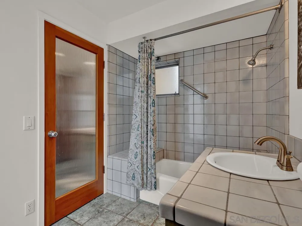 778 Ramona Place Del Mar, CA 92014 - Photo 49 of 72 a bathroom with a shower and a sink