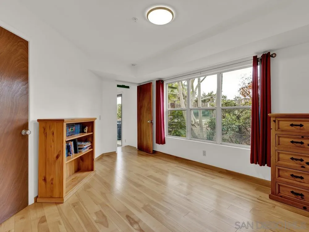 778 Ramona Place Del Mar, CA 92014 - Photo 50 of 72 an empty room with furniture and a large window